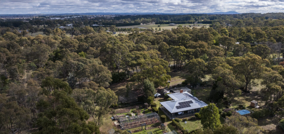Aerial view of the property with home battery